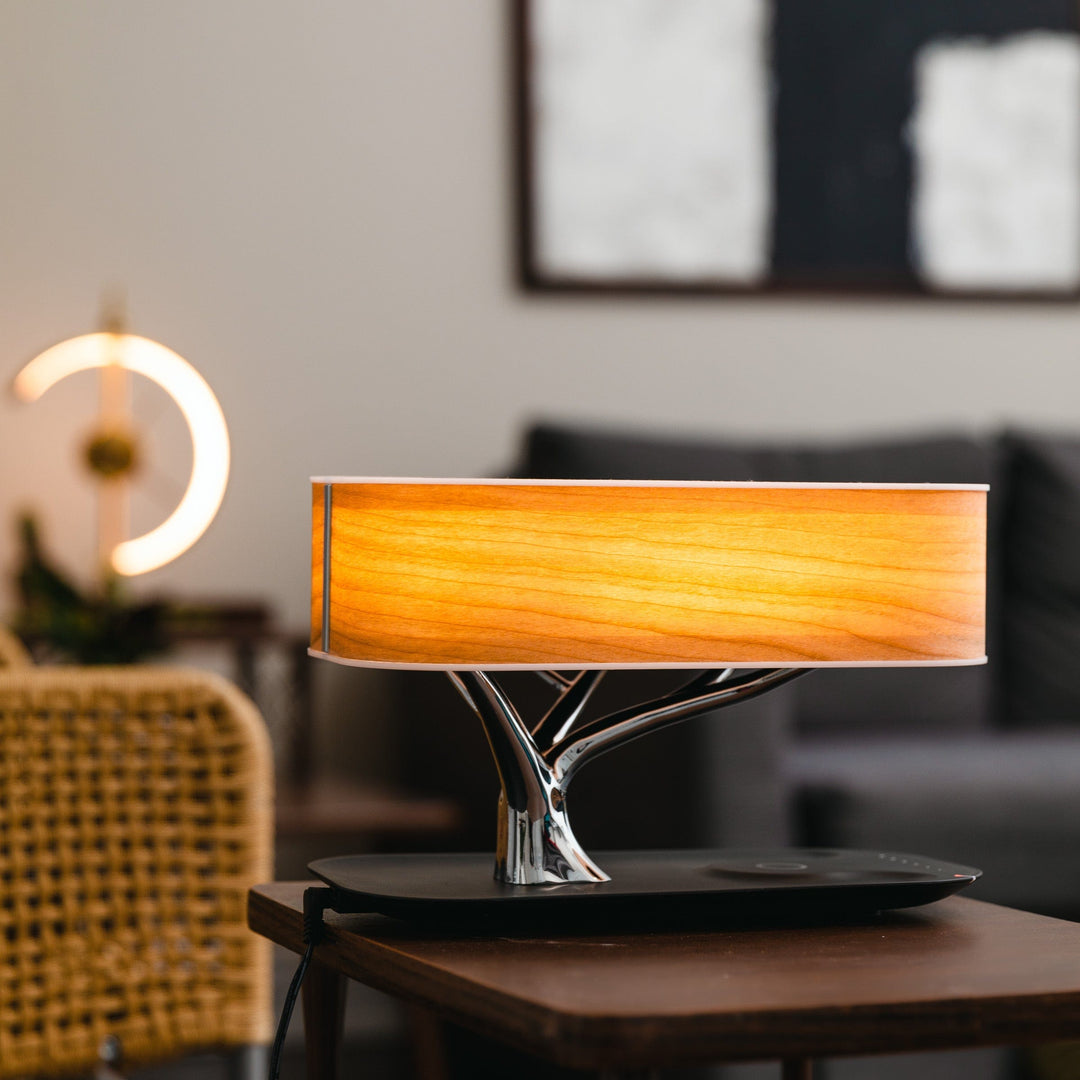 Designer LED table lamp with wood look, Bluetooth speaker and wireless charging function