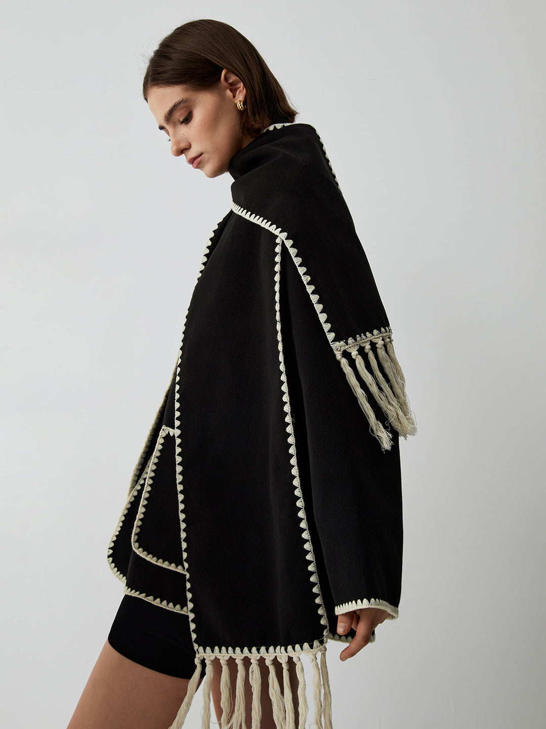 Women's coat with matching scarf and contrasting stitching