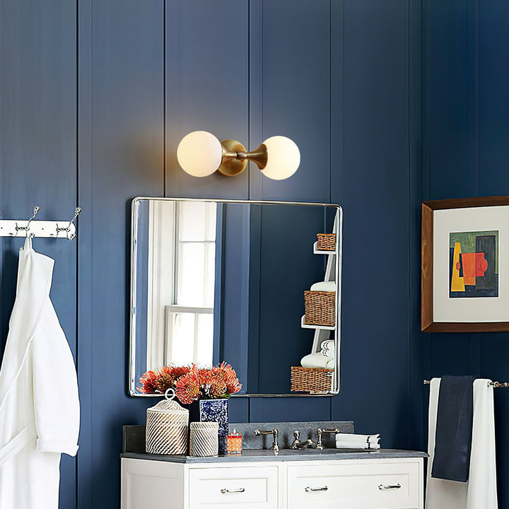 Vintage-style wall lamp made of glass and metal