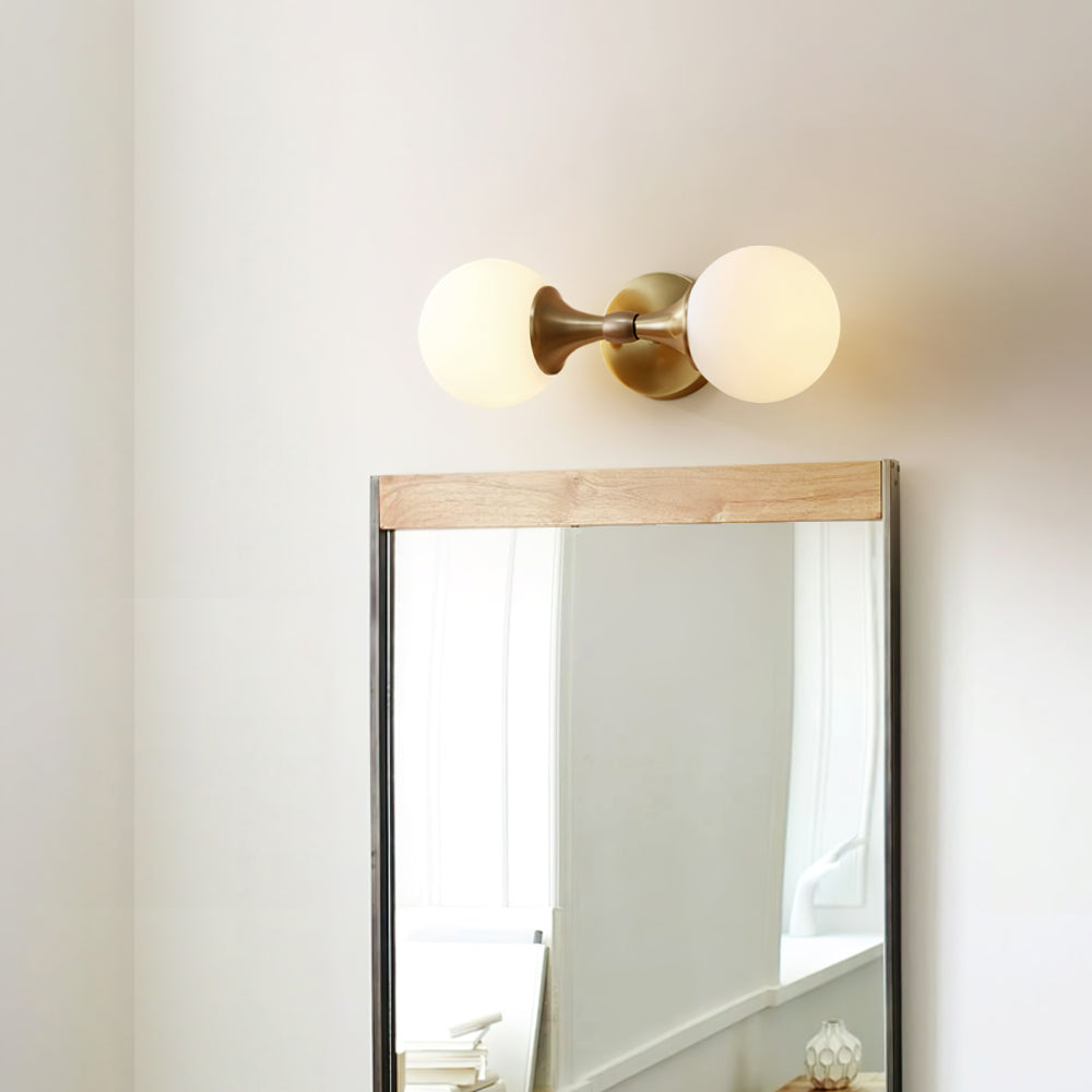 Vintage-style wall lamp made of glass and metal