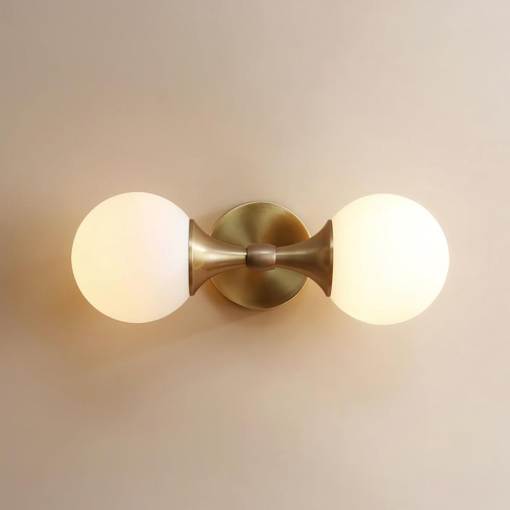 Vintage-style wall lamp made of glass and metal