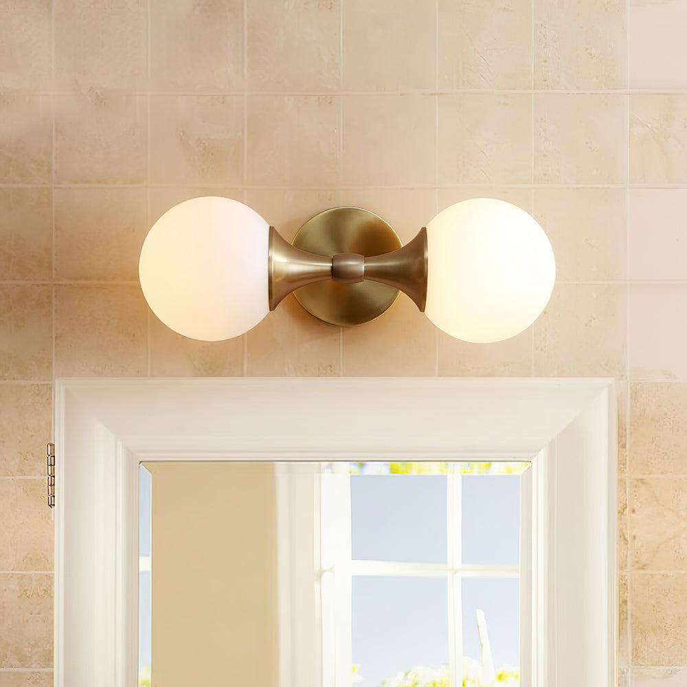 Vintage-style wall lamp made of glass and metal