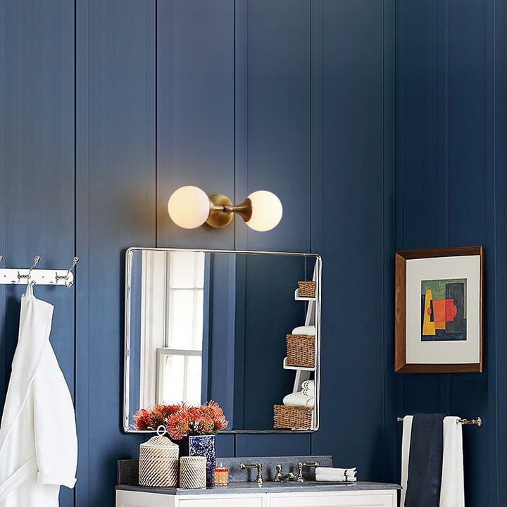 Vintage-style wall lamp made of glass and metal