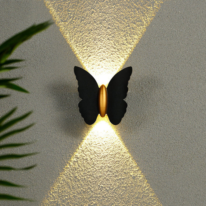 Butterfly wall light for outdoor areas with LED lighting