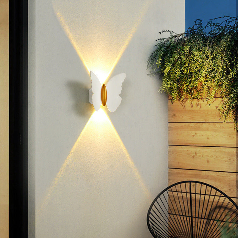 Butterfly wall light for outdoor areas with LED lighting