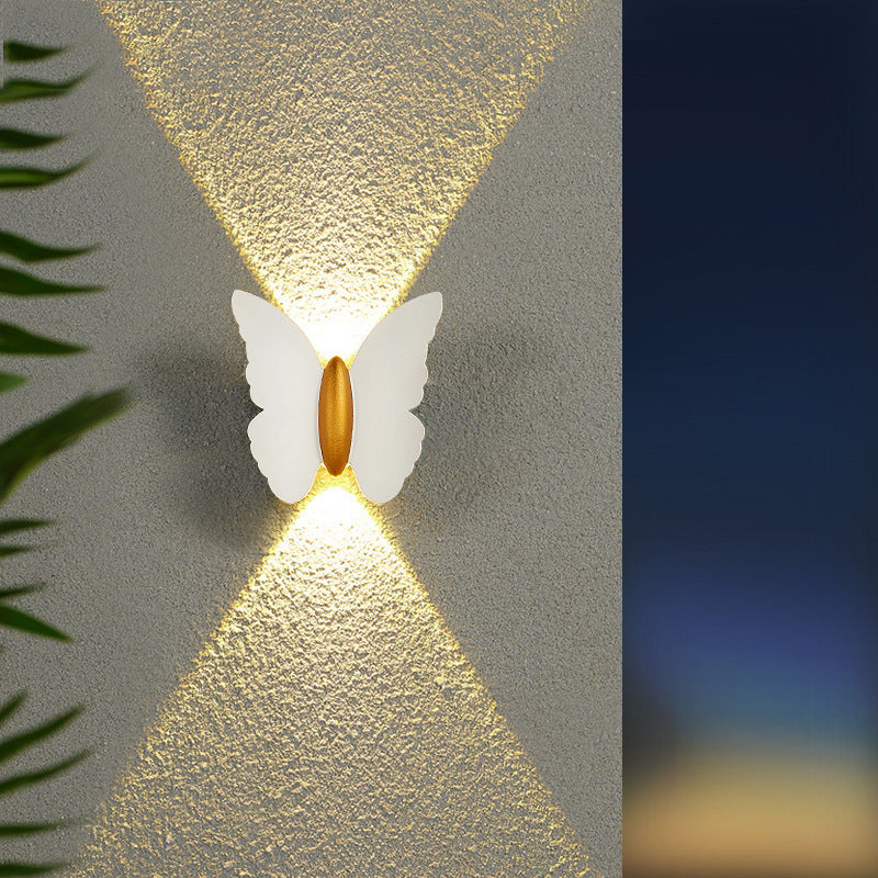 Butterfly wall light for outdoor areas with LED lighting