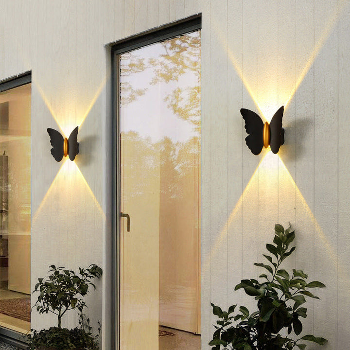 Butterfly wall light for outdoor areas with LED lighting