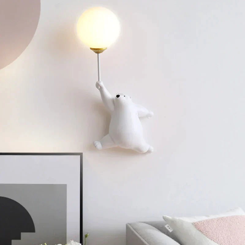 Playful, child-friendly LED wall light with animal motif 