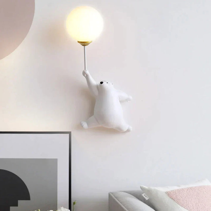 Playful, child-friendly LED wall light with animal motif 
