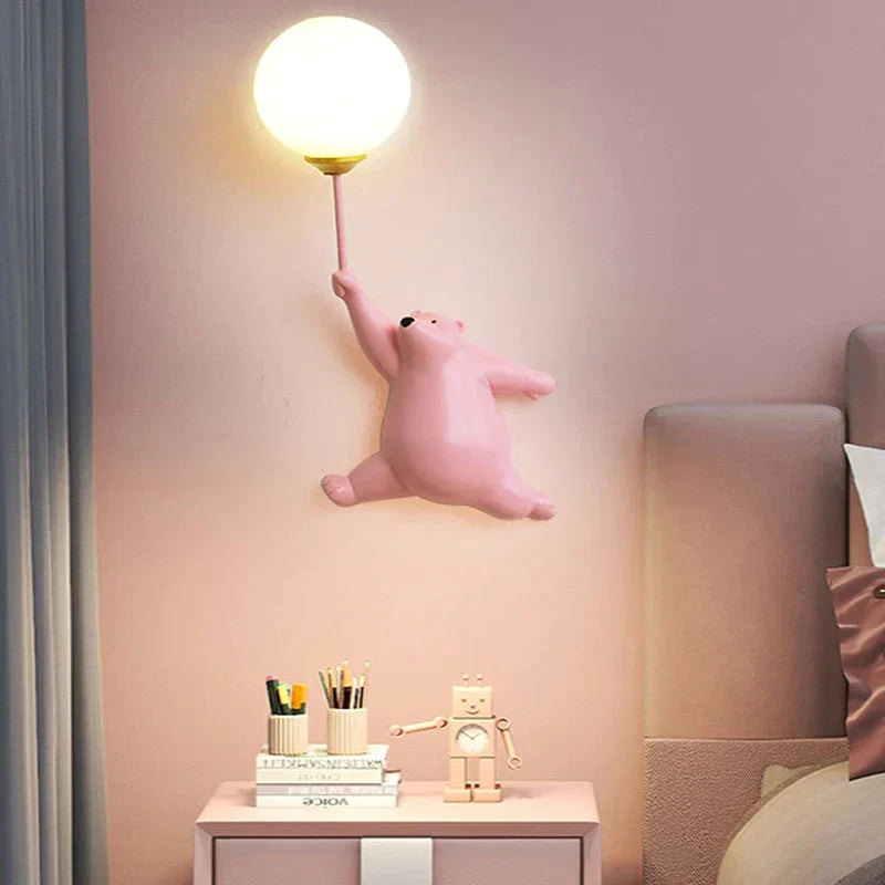 Playful, child-friendly LED wall light with animal motif 