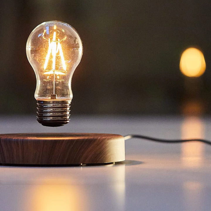 Floating lightbulb lamp with magnetic levitation