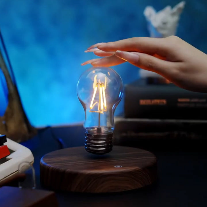 Floating lightbulb lamp with magnetic levitation