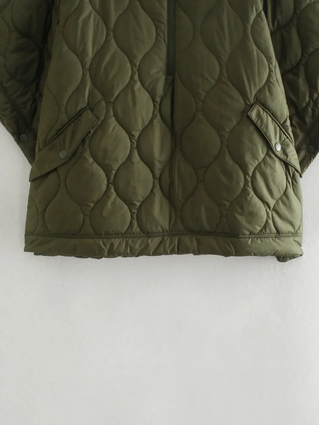 Women's quilted coat in oversized design with stand-up collar 