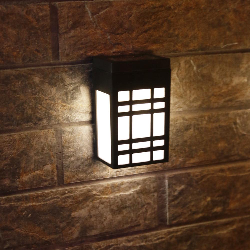 Minimalist, stylish solar wall light in Japanese design for garden and terrace