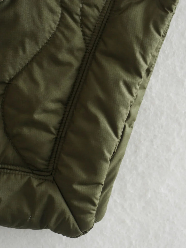 Women's quilted coat in oversized design with stand-up collar 