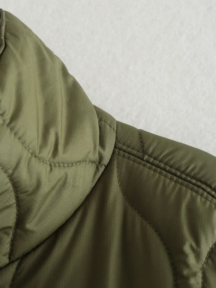 Women's quilted coat in oversized design with stand-up collar 