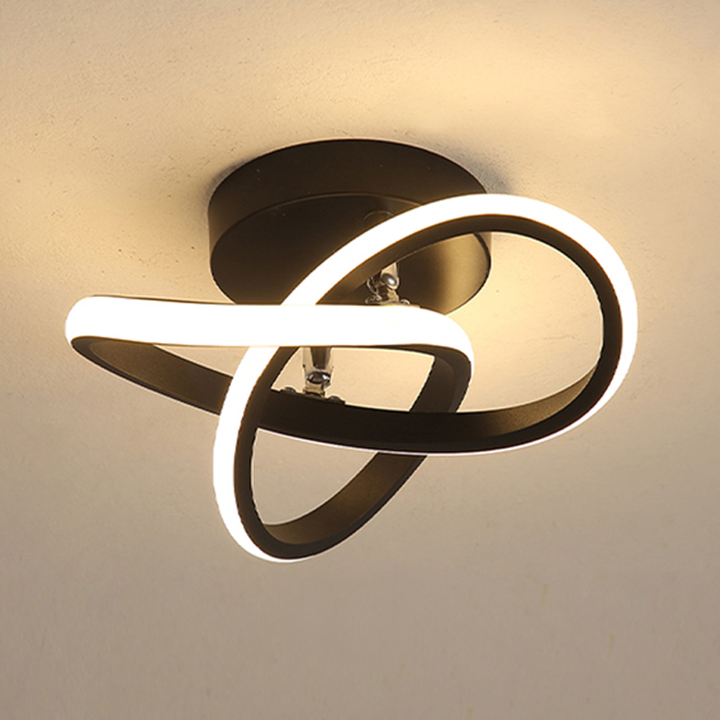 Modern LED ceiling light with three rings in a sculptural design