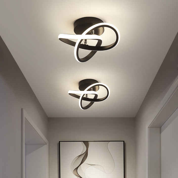Modern LED ceiling light with three rings in a sculptural design