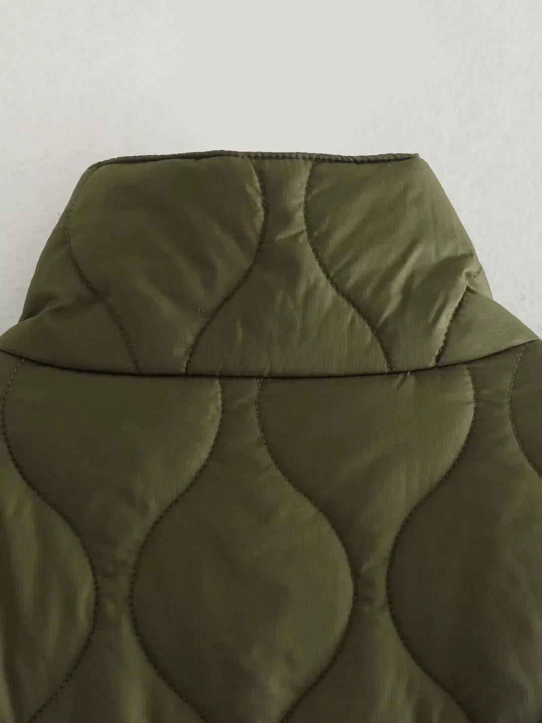 Women's quilted coat in oversized design with stand-up collar 