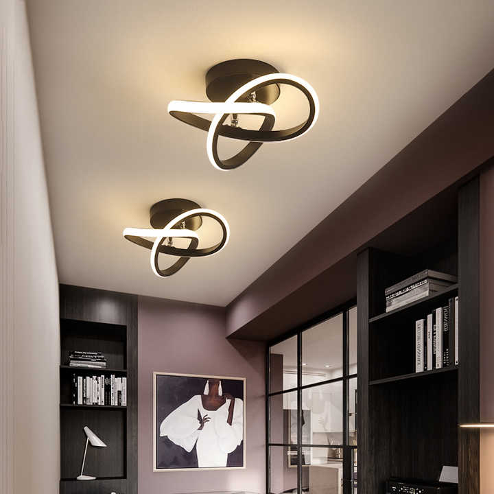 Modern LED ceiling light with three rings in a sculptural design