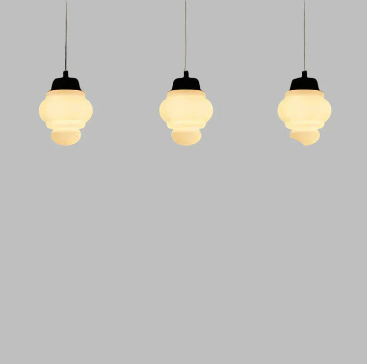 Pendant lamp made of white frosted glass in a geometric design