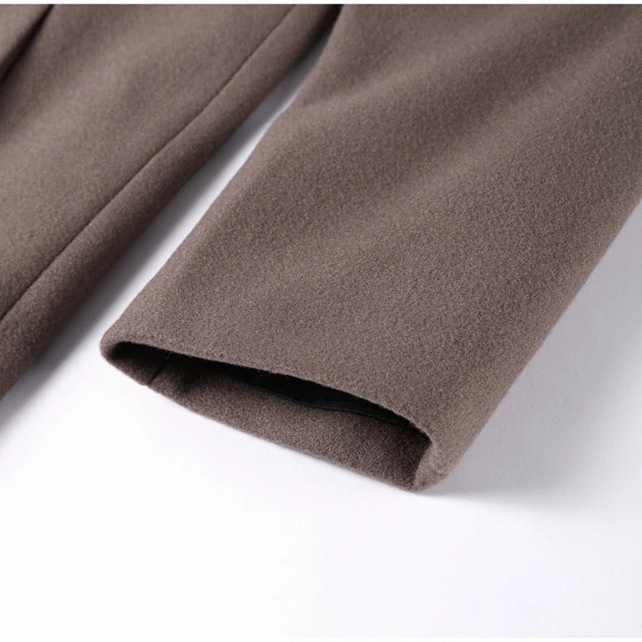 Women's coat with double-breasted button placket and oversized cut