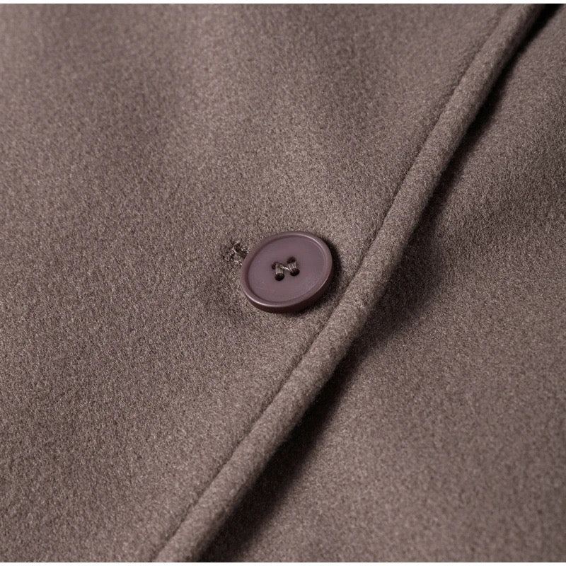Women's coat with double-breasted button placket and oversized cut