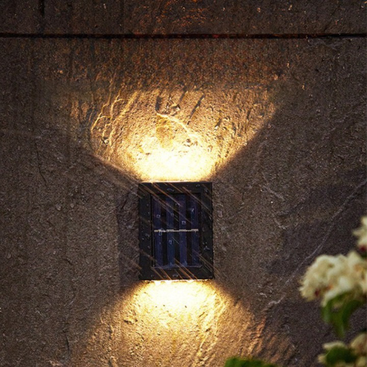 Solar-powered LED wall light for garden and path lighting