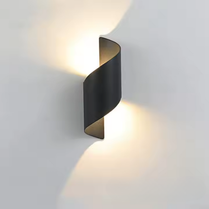 Modern black wall lamp with organic design and sculptural lighting effect