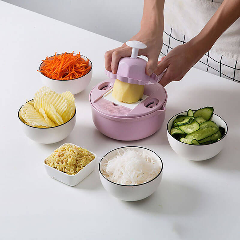12-in-1 vegetable slicer with interchangeable blades and collection container