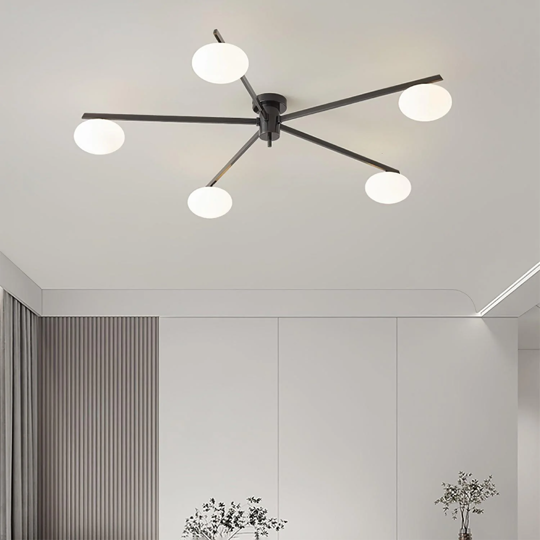 Modern ceiling light made of metal and glass in a minimalist design