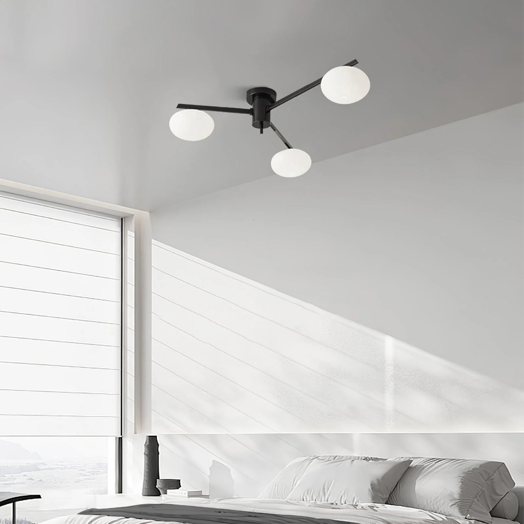 Modern ceiling light made of metal and glass in a minimalist design