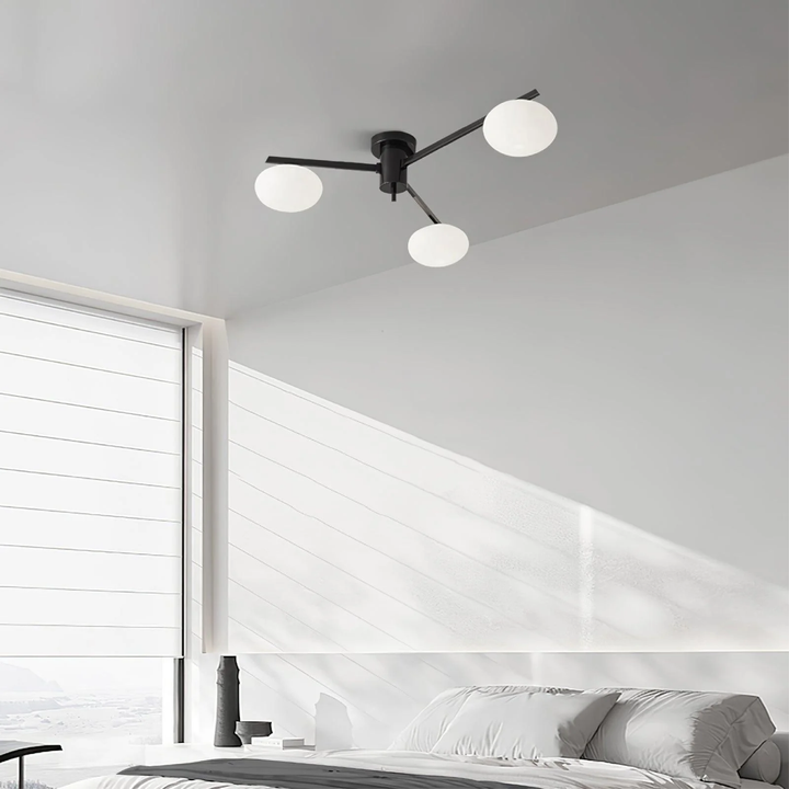 Modern ceiling light made of metal and glass in a minimalist design