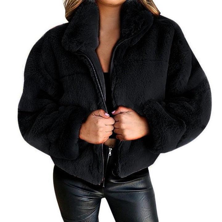 Women's faux fur coat with oversized cut and high collar 