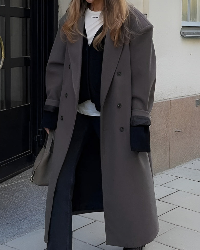 Women's coat with double-breasted button placket and oversized cut