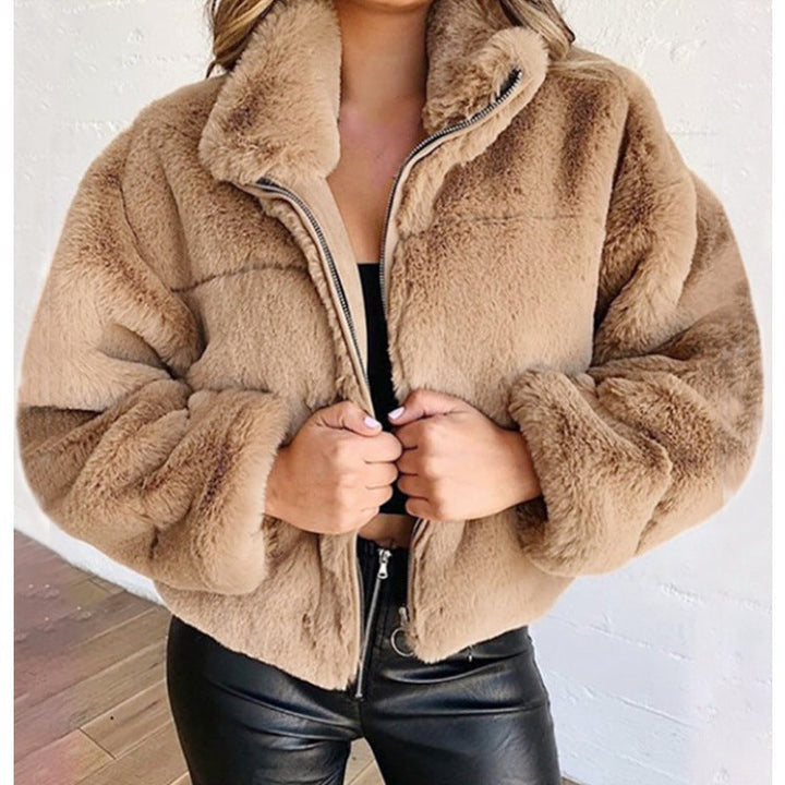 Women's faux fur coat with oversized cut and high collar 