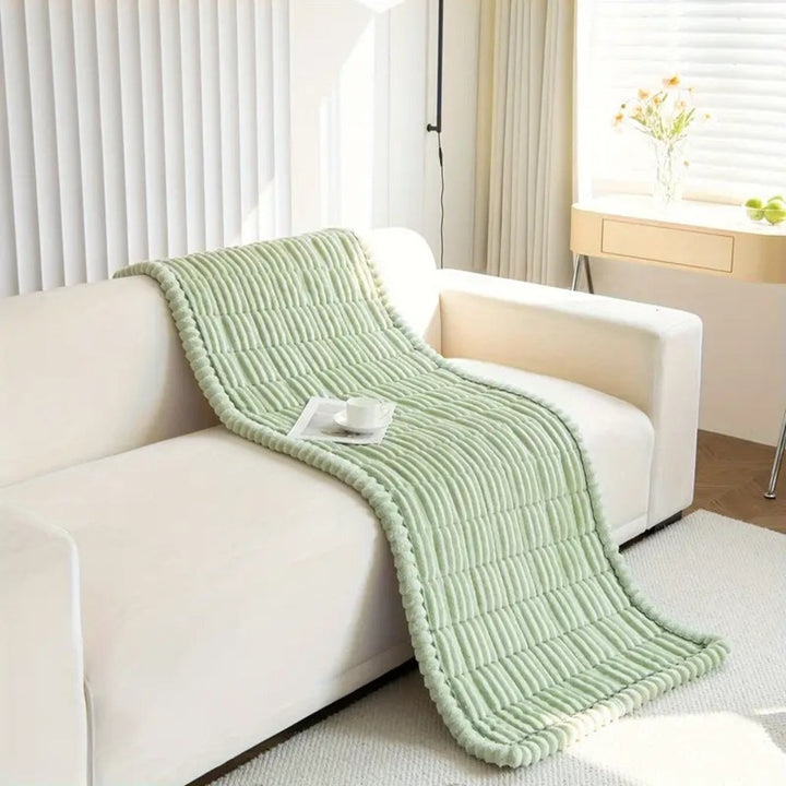 Sofa cover with pleated edge – flannel throw for stylish protection