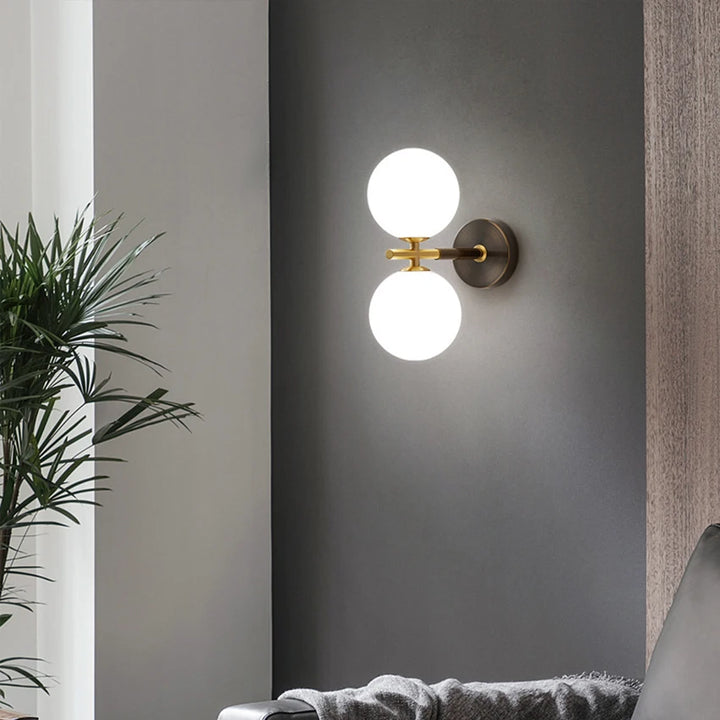 Wall light with spherical glass and brass elements for living room &amp; bedroom
