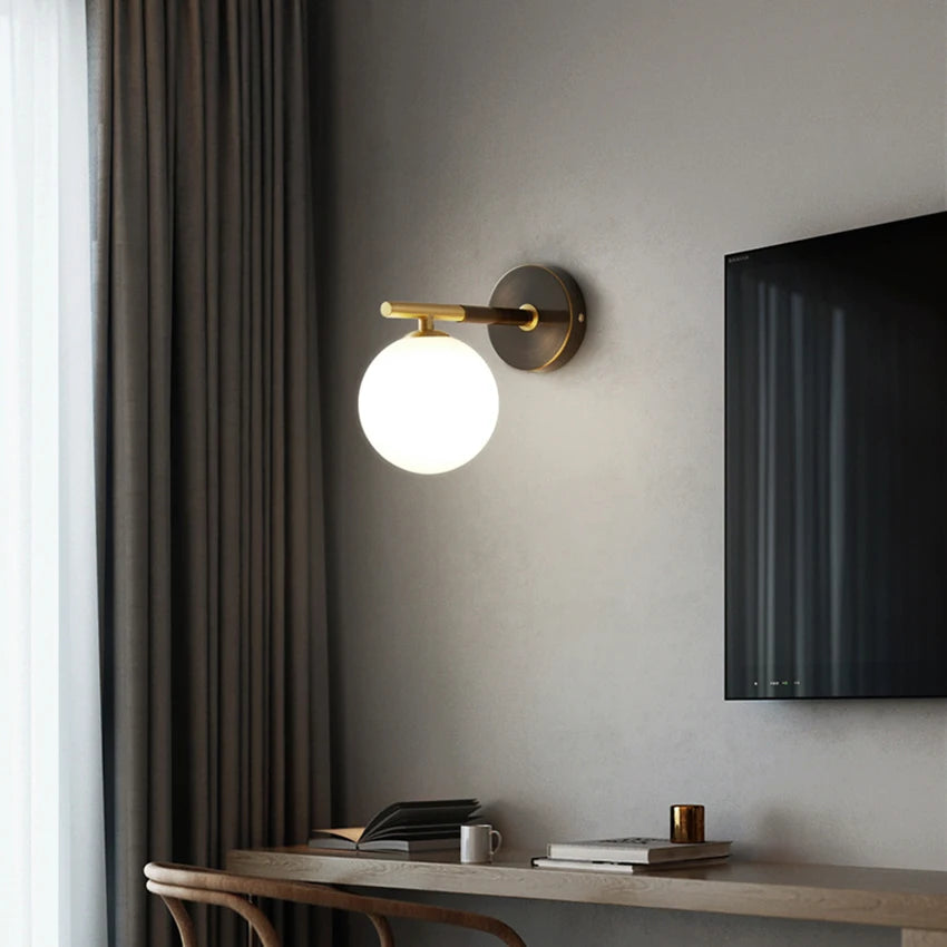 Wall light with spherical glass and brass elements for living room &amp; bedroom