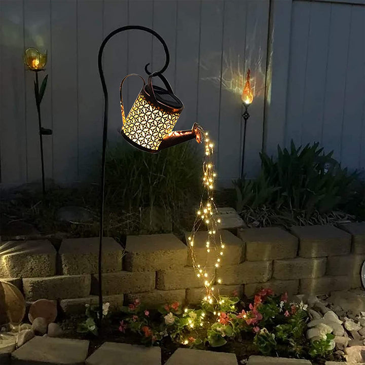Solar-powered watering can light with LED light cascade for the garden