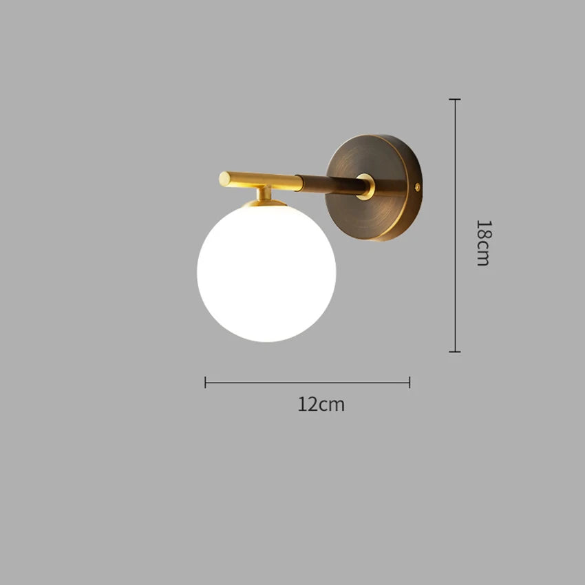 Wall light with spherical glass and brass elements for living room &amp; bedroom