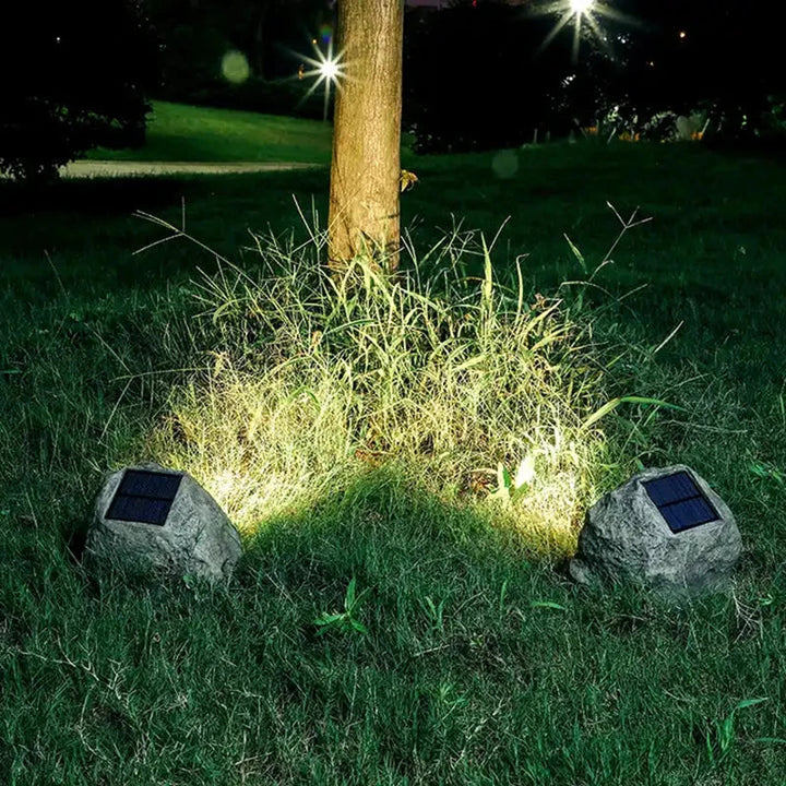Solar-powered LED path light in natural stone design