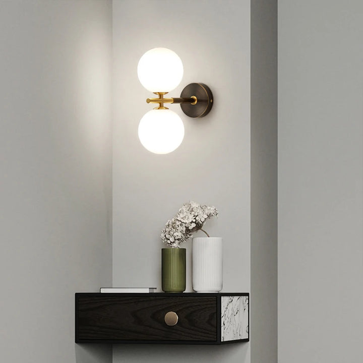 Wall light with spherical glass and brass elements for living room &amp; bedroom