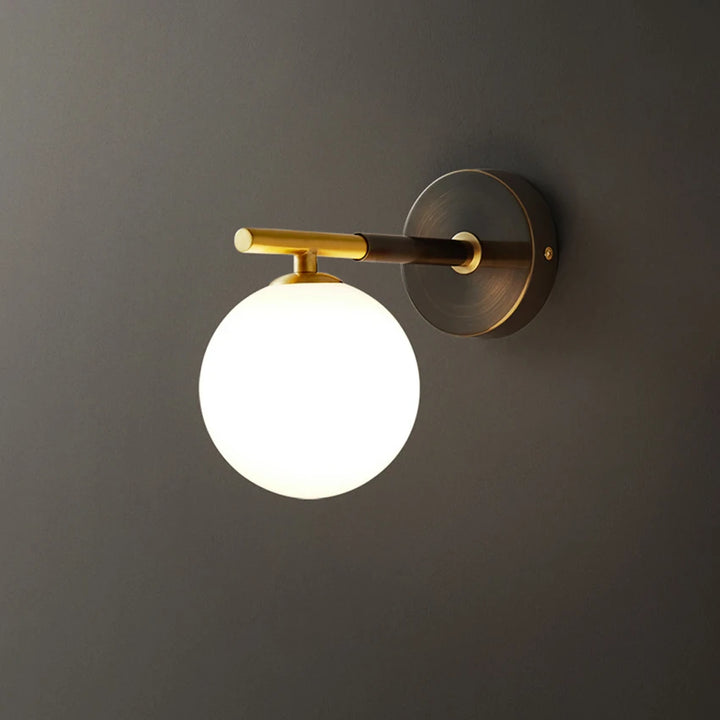 Wall light with spherical glass and brass elements for living room &amp; bedroom