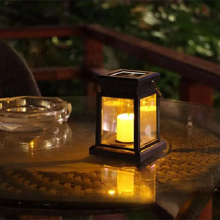 Solar-powered retro garden lantern with LED candle light for atmospheric nights