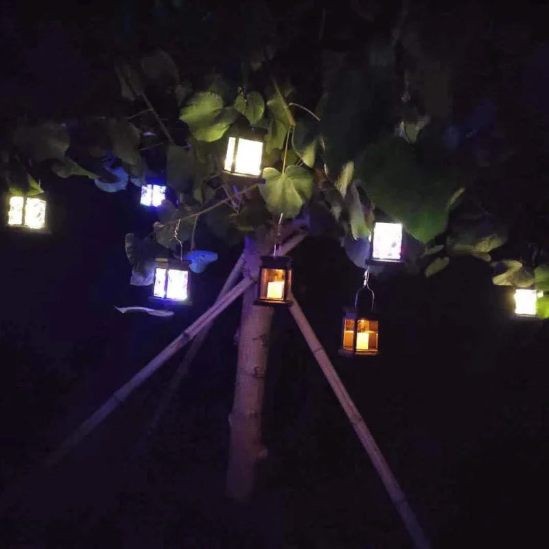 Solar-powered retro garden lantern with LED candle light for atmospheric nights