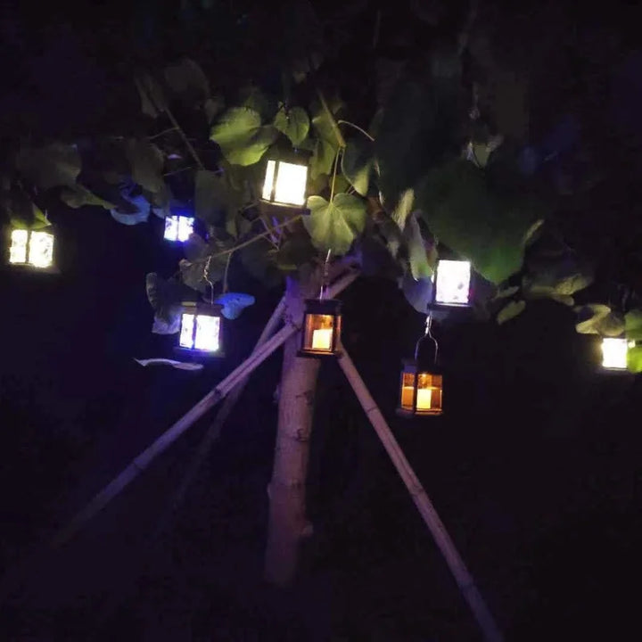 Solar-powered retro garden lantern with LED candle light for atmospheric nights