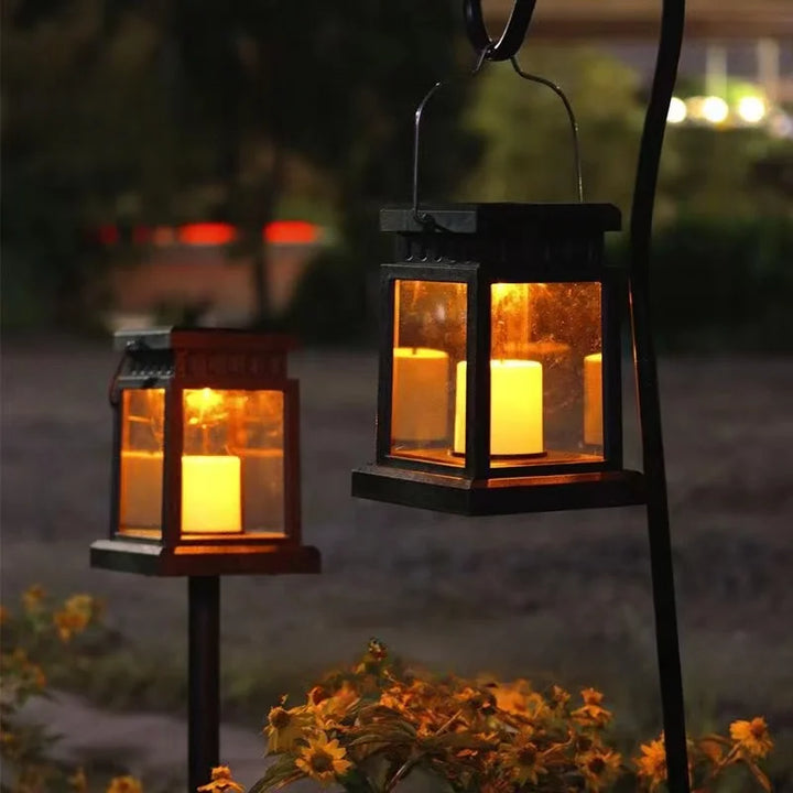 Solar-powered retro garden lantern with LED candle light for atmospheric nights