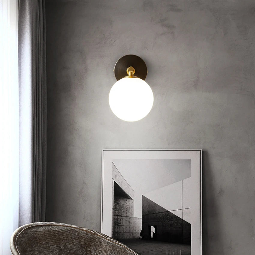 Wall light with spherical glass and brass elements for living room &amp; bedroom