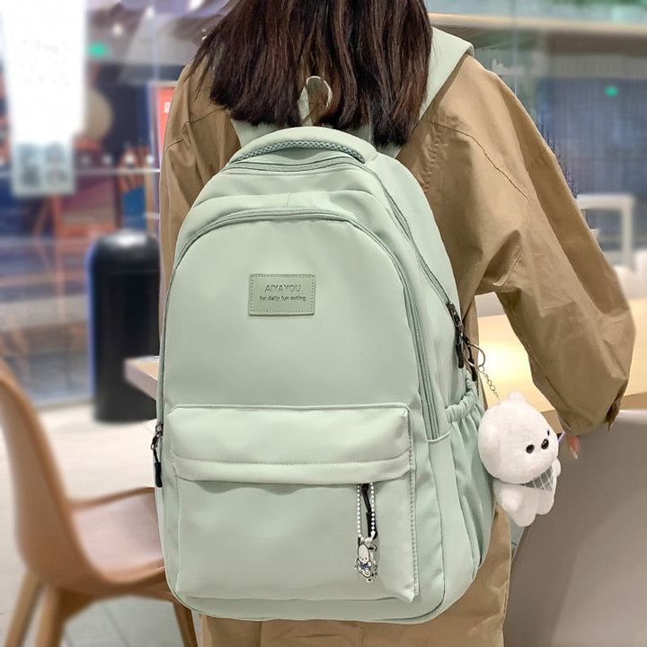 Waterproof school backpack with many compartments